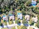 Aerial view of homes with pools in a residential area at 10108 Silver Bluff Dr, Leesburg, FL 34788