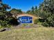 Silver Lake Forest community entrance sign with brick border and landscaping at 10108 Silver Bluff Dr, Leesburg, FL 34788