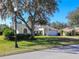 Single-Gathering home with a well-manicured lawn at 10108 Silver Bluff Dr, Leesburg, FL 34788