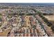 Aerial view of a large residential neighborhood, showing the community layout at 12306 Ne 48Th Way, Oxford, FL 34484