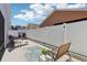 Outdoor patio area, fenced backyard, and lounge chairs for relaxation at 12306 Ne 48Th Way, Oxford, FL 34484