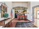 An interior bar area with custom stonework and decorative touches adds charm at 12306 Ne 48Th Way, Oxford, FL 34484