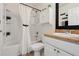Bathroom featuring tub, shower, toilet and large mirror at 12306 Ne 48Th Way, Oxford, FL 34484