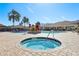 Enjoy the community's refreshing pool and spa area with lovely landscaping and ample lounging space at 12306 Ne 48Th Way, Oxford, FL 34484