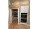 Organized walk-in pantry featuring shelving, ample storage, and easy access to kitchen necessities at 12306 Ne 48Th Way, Oxford, FL 34484
