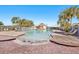 Community swimming pool with surrounding lounge chairs at 12306 Ne 48Th Way, Oxford, FL 34484