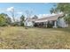 Large backyard with covered patio and room for outdoor entertaining at 1381 Winterville St, Deltona, FL 32725