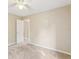 Spacious bedroom with neutral walls, carpet, and ceiling fan at 1381 Winterville St, Deltona, FL 32725