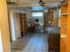 Unfinished basement area with storage shelving at 13920 S Highway 25, Eastlake Weir, FL 32133