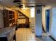 Unfinished basement with shelving and storage at 13920 S Highway 25, Eastlake Weir, FL 32133