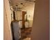 Basement laundry room with washer, dryer, and storage at 13920 S Highway 25, Eastlake Weir, FL 32133