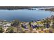 Lakefront property with modern home and dock at 1535 Sunset Cir, Mount Dora, FL 32757