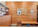 Organized closet with wooden walls and shelving at 1535 Sunset Cir, Mount Dora, FL 32757