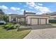 Modern two-story home with two-car garage and attractive landscaping at 1535 Sunset Cir, Mount Dora, FL 32757