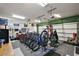 Garage with multiple bicycles and exercise equipment at 1535 Sunset Cir, Mount Dora, FL 32757