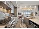 Modern kitchen with island and stainless steel appliances at 1535 Sunset Cir, Mount Dora, FL 32757