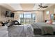 Main bedroom with lake view and cozy sitting area at 1535 Sunset Cir, Mount Dora, FL 32757