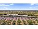 Aerial view of town center with parking lot and retail including Publix, Wendy's, and other businesses at 16967 Se 93Rd Cuthbert Cir, The Villages, FL 32162