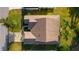 Single-Gathering home with brown roof and landscaped yard, seen from above at 17030 Se 79Th Clearview Ave, The Villages, FL 32162