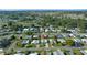 Aerial view of a home in a residential community at 1706 Pebble Beach Ln, Lady Lake, FL 32159