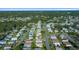 An aerial view showcasing the property's setting at 1706 Pebble Beach Ln, Lady Lake, FL 32159