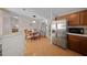 Kitchen with stainless steel appliances and breakfast bar at 1706 Pebble Beach Ln, Lady Lake, FL 32159