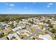 Aerial view showcasing a home's setting in a residential area at 1842 Captiva Ct, The Villages, FL 32162