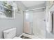 Clean bathroom with a shower/tub combo and updated fixtures at 1842 Captiva Ct, The Villages, FL 32162