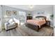 Relaxing main bedroom with plush carpet and an ensuite bathroom at 1842 Captiva Ct, The Villages, FL 32162