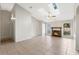 Living room with vaulted ceiling, skylights, and fireplace at 2121 Croat St, Mount Dora, FL 32757