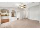 Open living room with a view into the kitchen area at 2121 Croat St, Mount Dora, FL 32757