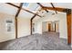 Main bedroom with vaulted ceiling, skylights and carpet flooring at 2121 Croat St, Mount Dora, FL 32757