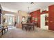 Formal dining room with a chandelier and view of the kitchen at 2134 Zaragoza Pl, The Villages, FL 32159