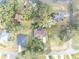 Aerial view showcasing home's location in a residential neighborhood at 214 Forest Park Ln, Lady Lake, FL 32159