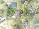 An aerial shot showcasing a home's location within a residential neighborhood at 214 Forest Park Ln, Lady Lake, FL 32159