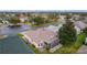 Aerial view showcasing home's backyard, patio, and neighborhood at 2240 Avon Loop, The Villages, FL 32162