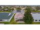 Aerial view highlighting house and surrounding neighborhood at 2240 Avon Loop, The Villages, FL 32162