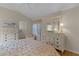 Main bedroom with large dresser and walk-in closet at 2240 Avon Loop, The Villages, FL 32162