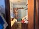 Bathroom with shower/tub combo and wood vanity at 225 N West St, Bushnell, FL 33513