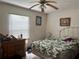 Bedroom with double bed and ceiling fan at 225 N West St, Bushnell, FL 33513