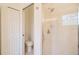 Small bathroom with toilet and shower at 2298 Caledonian St, Clermont, FL 34711