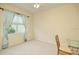 Small bedroom with window and table at 2298 Caledonian St, Clermont, FL 34711