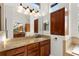 Bathroom with granite countertops and double sinks at 2441 Bar Harbor Bay, Mount Dora, FL 32757