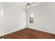 Well-lit bedroom with hardwood floors and window at 2441 Bar Harbor Bay, Mount Dora, FL 32757