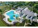 Aerial view of community pool, spa, and clubhouse at 2441 Bar Harbor Bay, Mount Dora, FL 32757