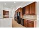 Kitchen with granite countertops and ample cabinetry at 2441 Bar Harbor Bay, Mount Dora, FL 32757