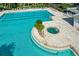 Resort-style pool with spa and plenty of lounge chairs at 2441 Bar Harbor Bay, Mount Dora, FL 32757