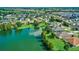 This community boasts a scenic lake and many homes with green lawns at 2532 Edenville Path, The Villages, FL 32162