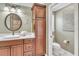 Bathroom boasts a large vanity, toilet, and a separate shower at 2532 Edenville Path, The Villages, FL 32162