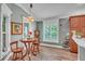 Breakfast nook with wood table and chairs in the kitchen at 2532 Edenville Path, The Villages, FL 32162